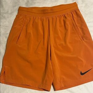 Nike Men's Bright Orange Athletic Shorts size small